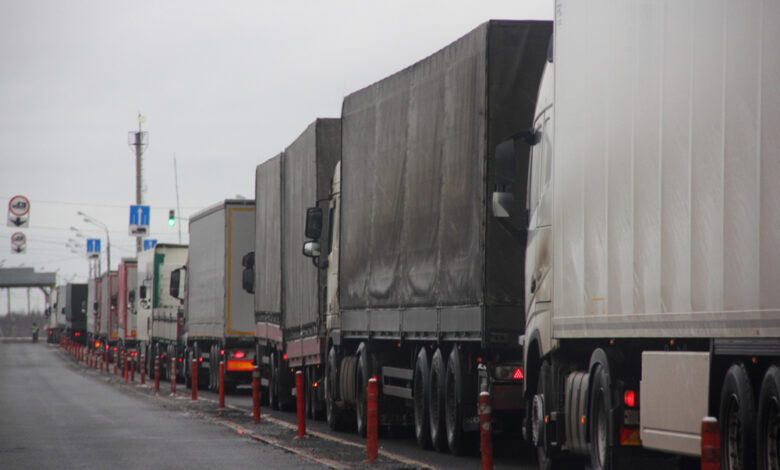 Truck inspection - a long congestion traffic of many trucks with